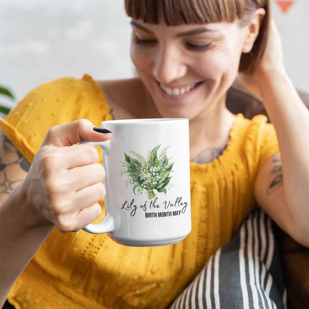 Woman is holding 15oz ceramic coffee/tea mug